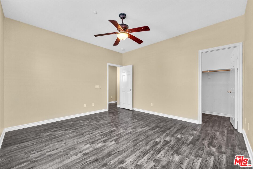 5611 Scharf Avenue Fontana, CA 92336 - Photo 38 of 49 a view of empty room with wooden floor