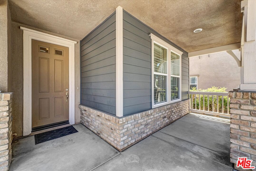 5611 Scharf Avenue Fontana, CA 92336 - Photo 5 of 49 a view of front door of house