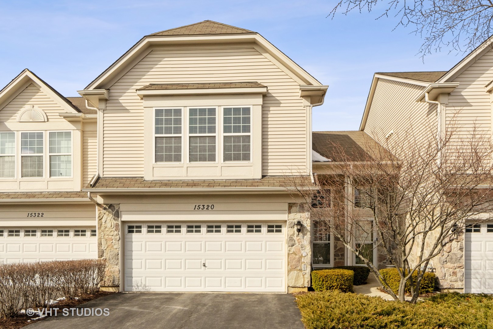15320 Pinewood Road Lockport, IL 60441 - Photo 1 of 22 a front view of a house with a yard