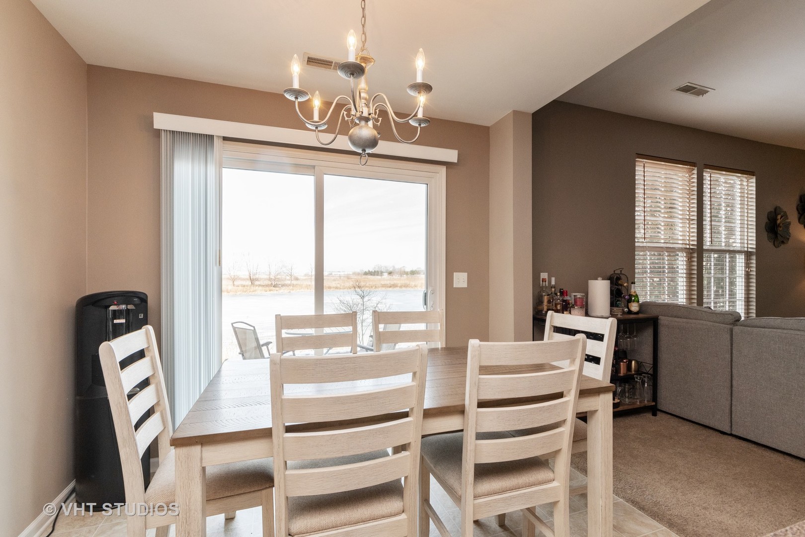 15320 Pinewood Road Lockport, IL 60441 - Photo 11 of 22 a view of a dining room with furniture window and outside view