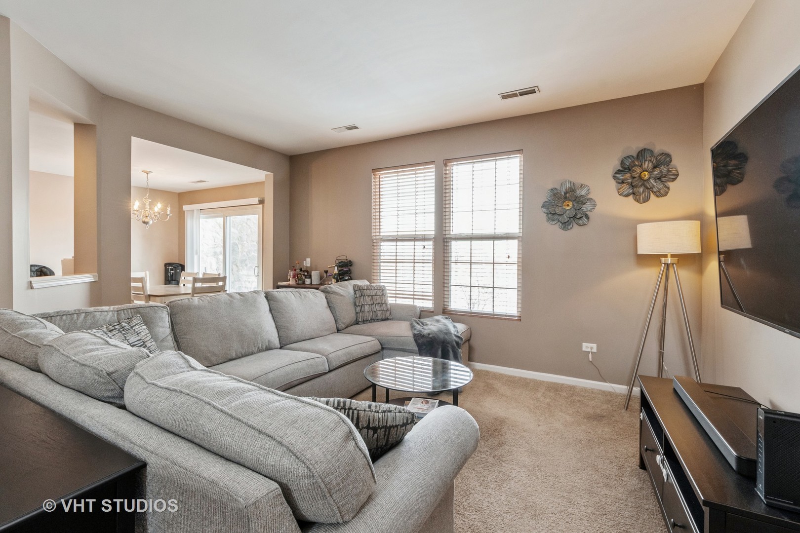 15320 Pinewood Road Lockport, IL 60441 - Photo 5 of 22 a living room with furniture and a flat screen tv