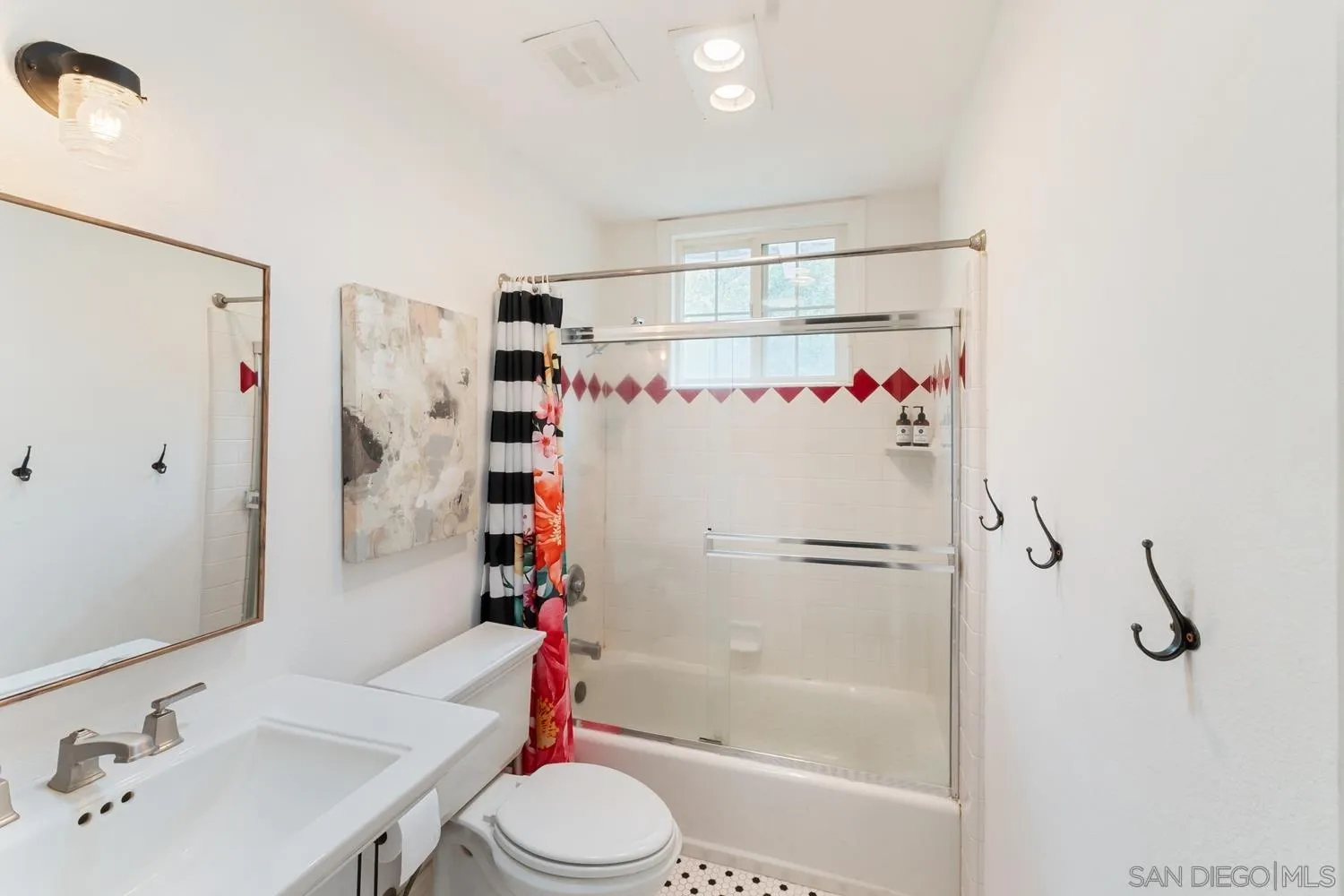 3517 Deer Lake Park Road Julian, CA 92036 - Photo 34 of 75 a white bath tub sitting next to a white sink and vanity