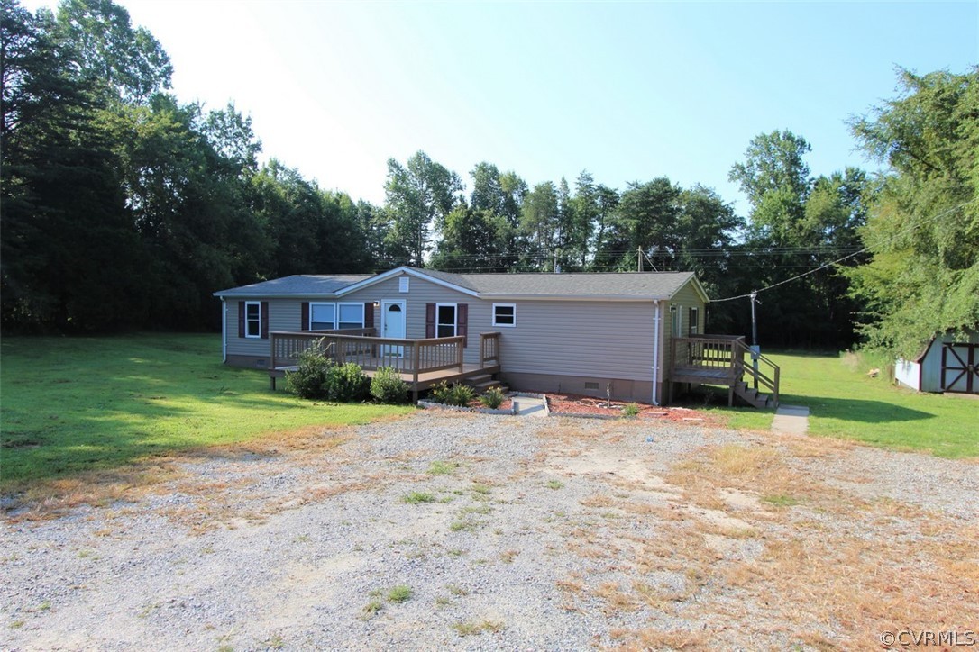 1400 River Road Farmville, VA 23901 - Photo 5 of 29 a front view of a house with a yard and garage
