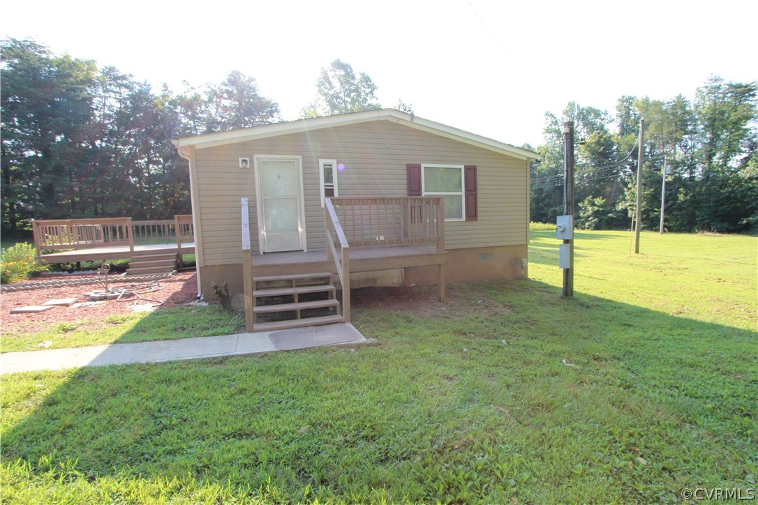 1400 River Road Farmville, VA 23901 - Photo 6 of 29 a view of a backyard with a garden and plants
