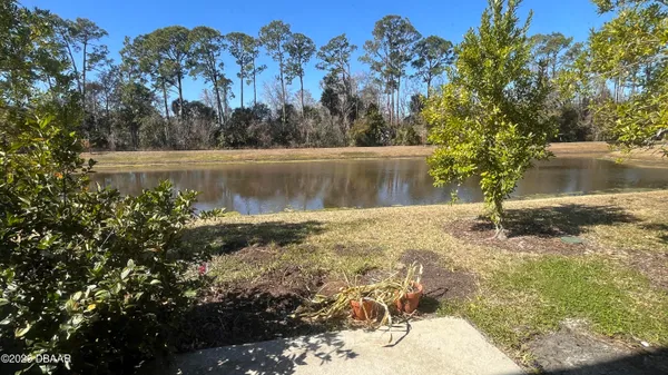 a view of lake with mountain