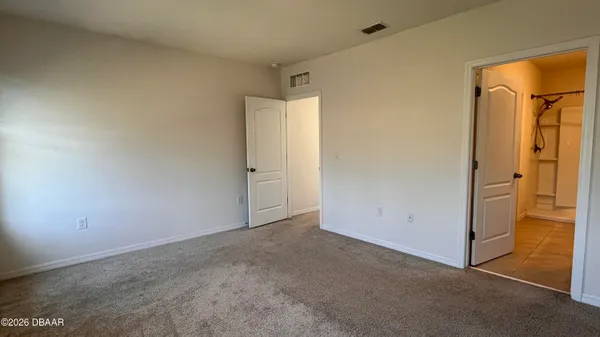 a bathroom with a double vanity sink mirror and shower