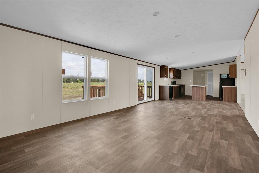 1223 Old Ida Road Sherman, TX 75090 - Photo 12 of 20 a view of empty room with furniture and window