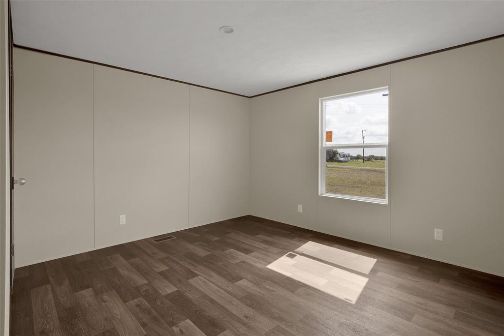 1223 Old Ida Road Sherman, TX 75090 - Photo 13 of 20 an empty room with windows and refrigerator