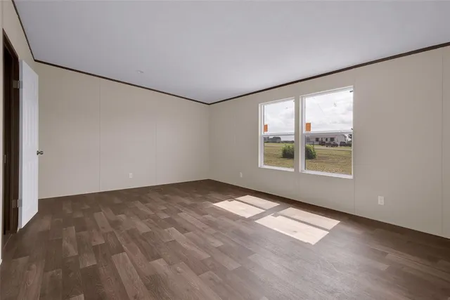 an empty room with windows