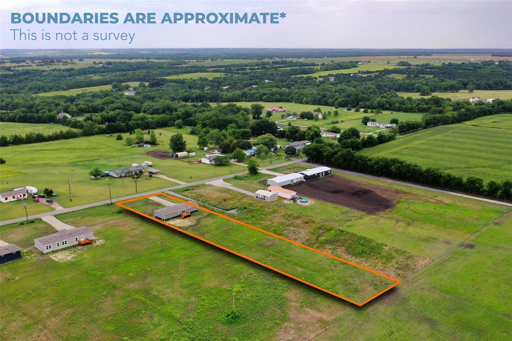 1223 Old Ida Road Sherman, TX 75090 - Photo 3 of 20 a view of a golf course with an outdoor space