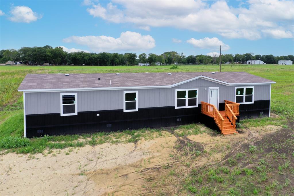 1223 Old Ida Road Sherman, TX 75090 - Photo 4 of 20 a view of a house with a yard