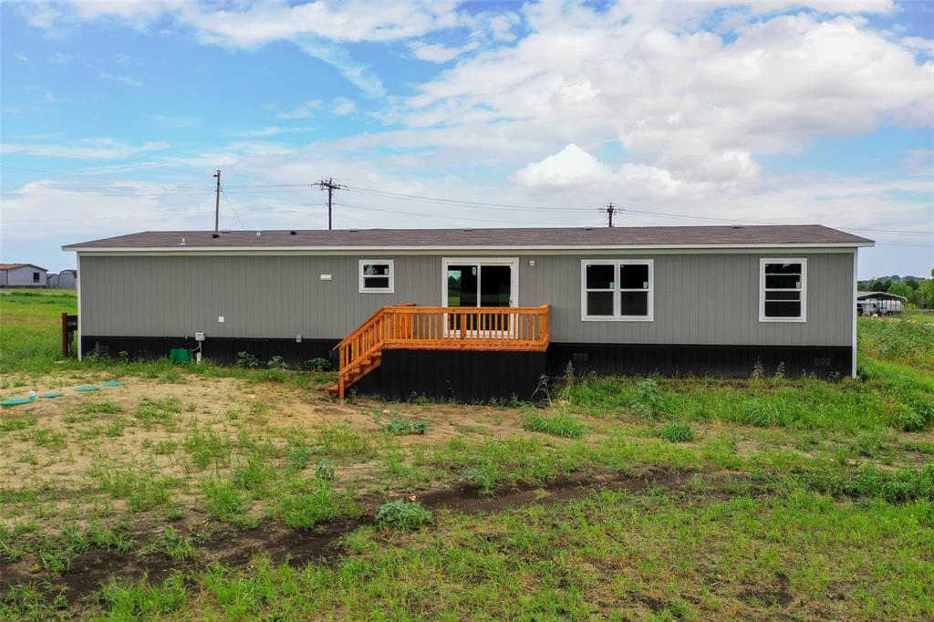 1223 Old Ida Road Sherman, TX 75090 - Photo 5 of 20 a front view of a house with garden