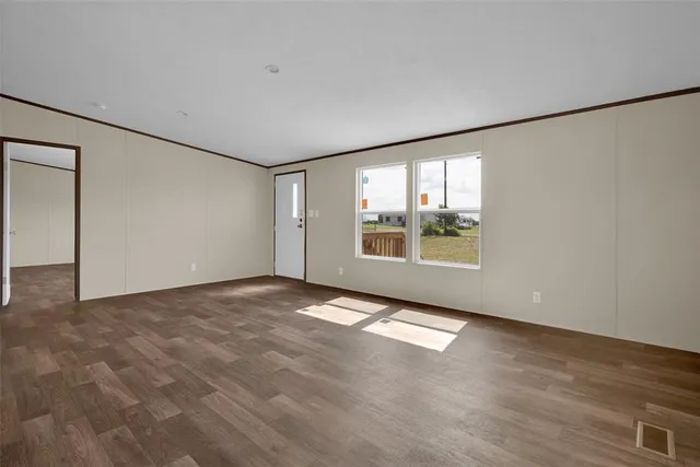 an empty room with windows