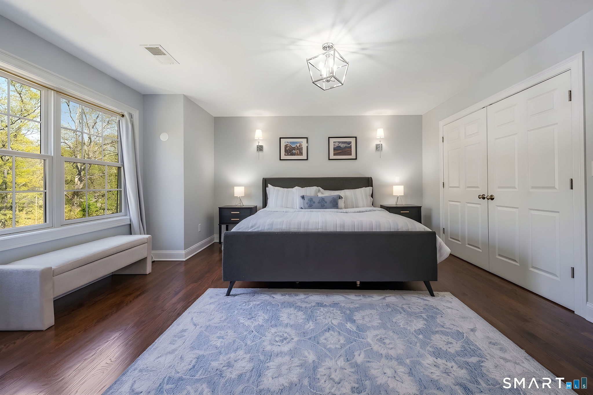 9 Sunset Ridge Drive Guilford, CT 06437 - Photo 19 of 40 a bedroom with a bed and a window