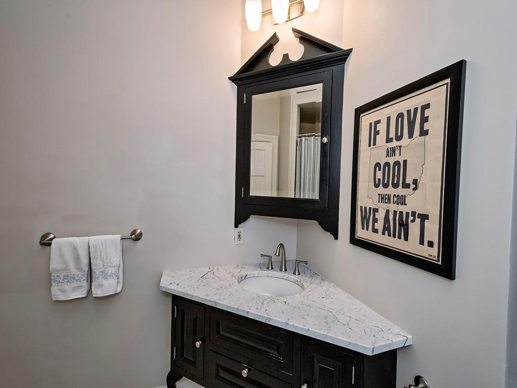 606 Bower Hill Road Pittsburgh, PA 15243 - Photo 18 of 24 a bathroom with a sink and a mirror