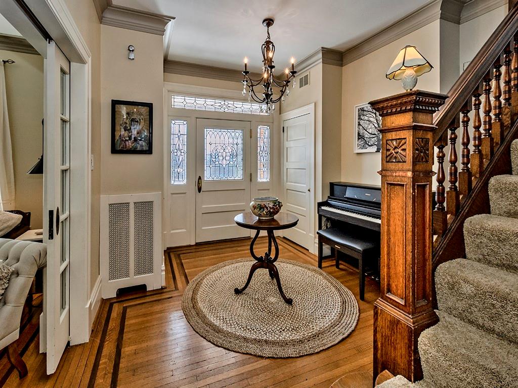 606 Bower Hill Road Pittsburgh, PA 15243 - Photo 2 of 24 a living room with furniture a piano and a chandelier