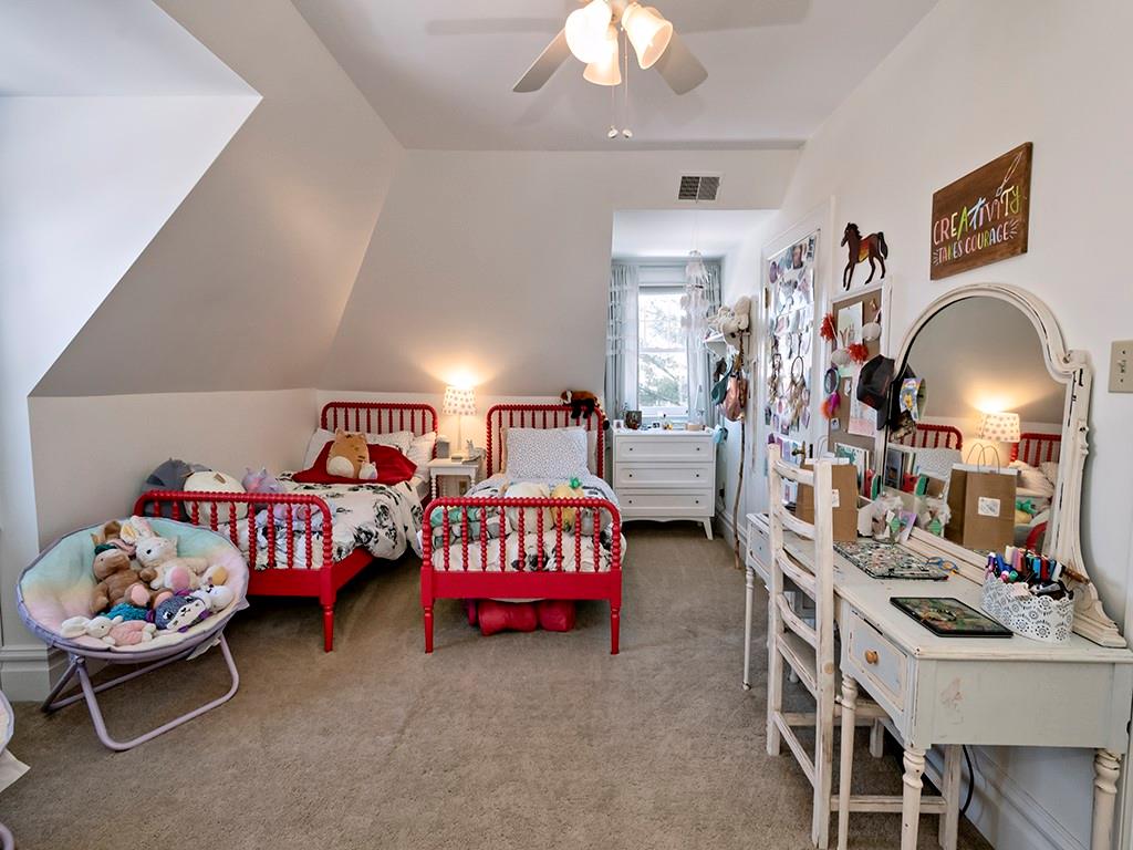 606 Bower Hill Road Pittsburgh, PA 15243 - Photo 22 of 24 a bedroom with bed and a chandelier