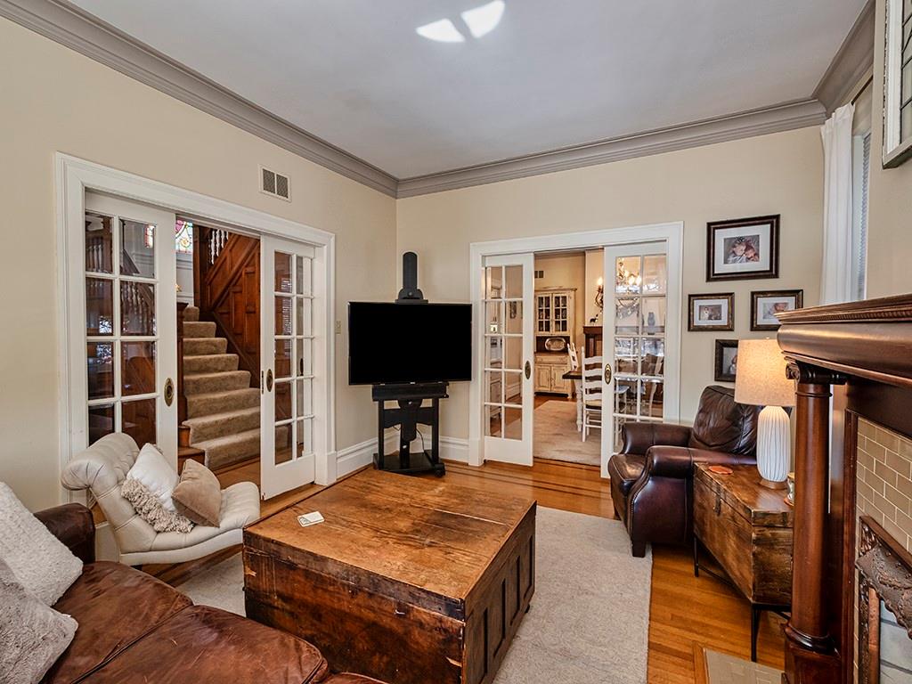 606 Bower Hill Road Pittsburgh, PA 15243 - Photo 5 of 24 a living room with furniture and a flat screen tv