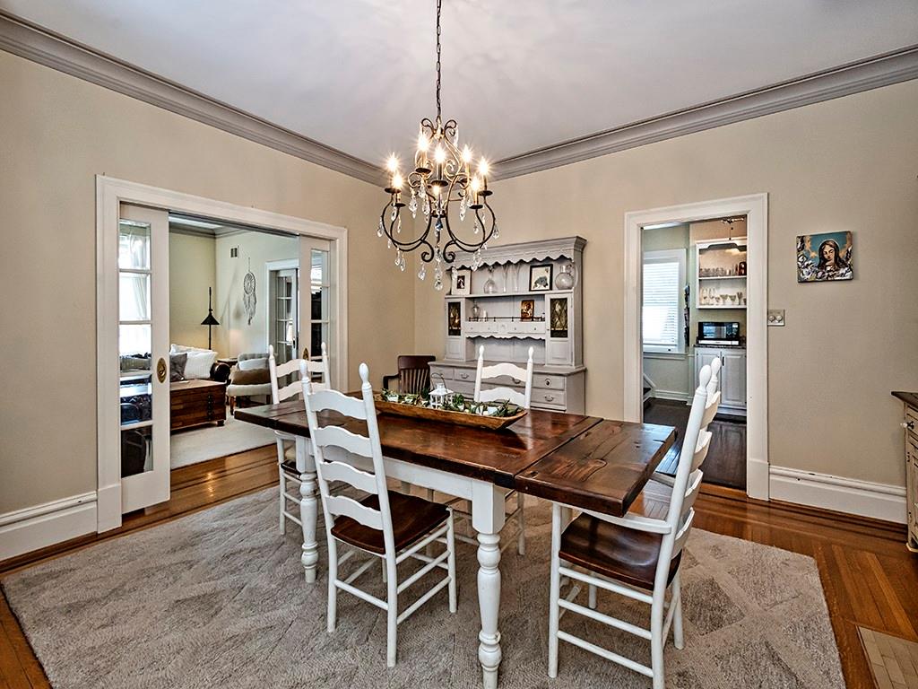606 Bower Hill Road Pittsburgh, PA 15243 - Photo 8 of 24 a view of a dining room with furniture and wooden floor