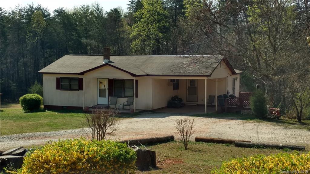 a house that has tree in front of it