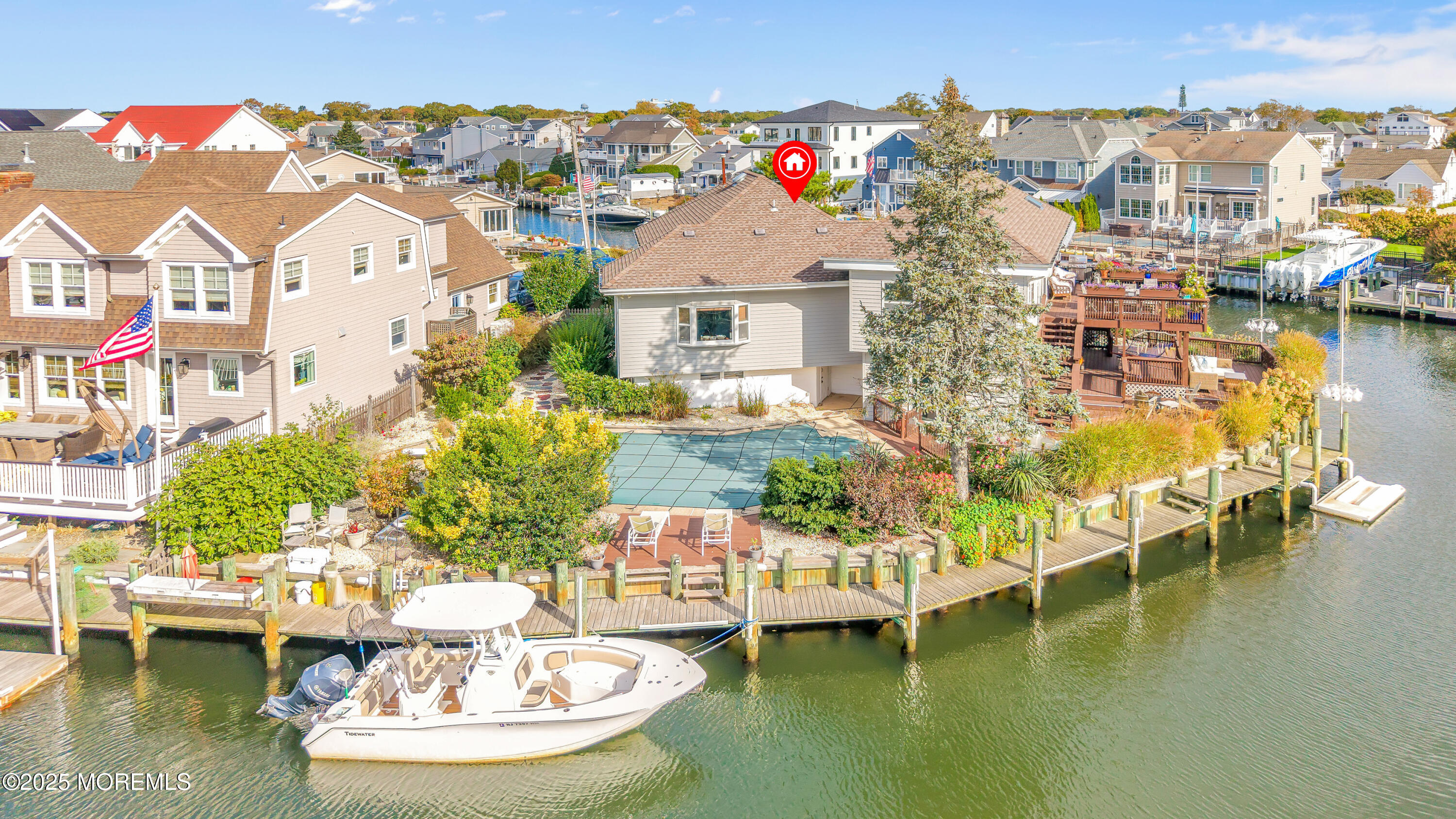 1700 Rue Mirador Point Pleasant, NJ 08742 - Photo 12 of 63 a view of a lake with a house swimming pool and outdoor space