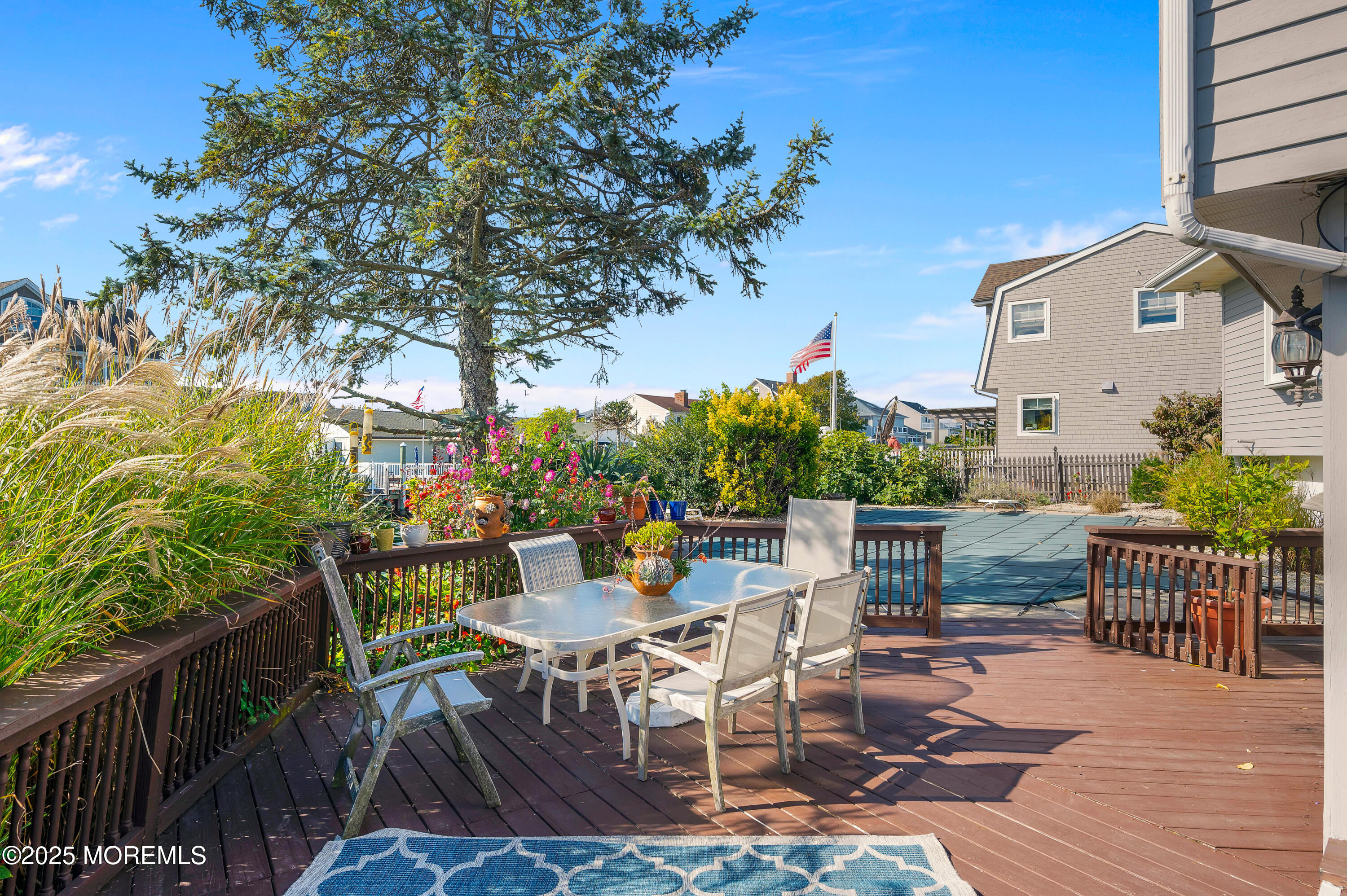 1700 Rue Mirador Point Pleasant, NJ 08742 - Photo 22 of 63 a view of a chairs and table in patio