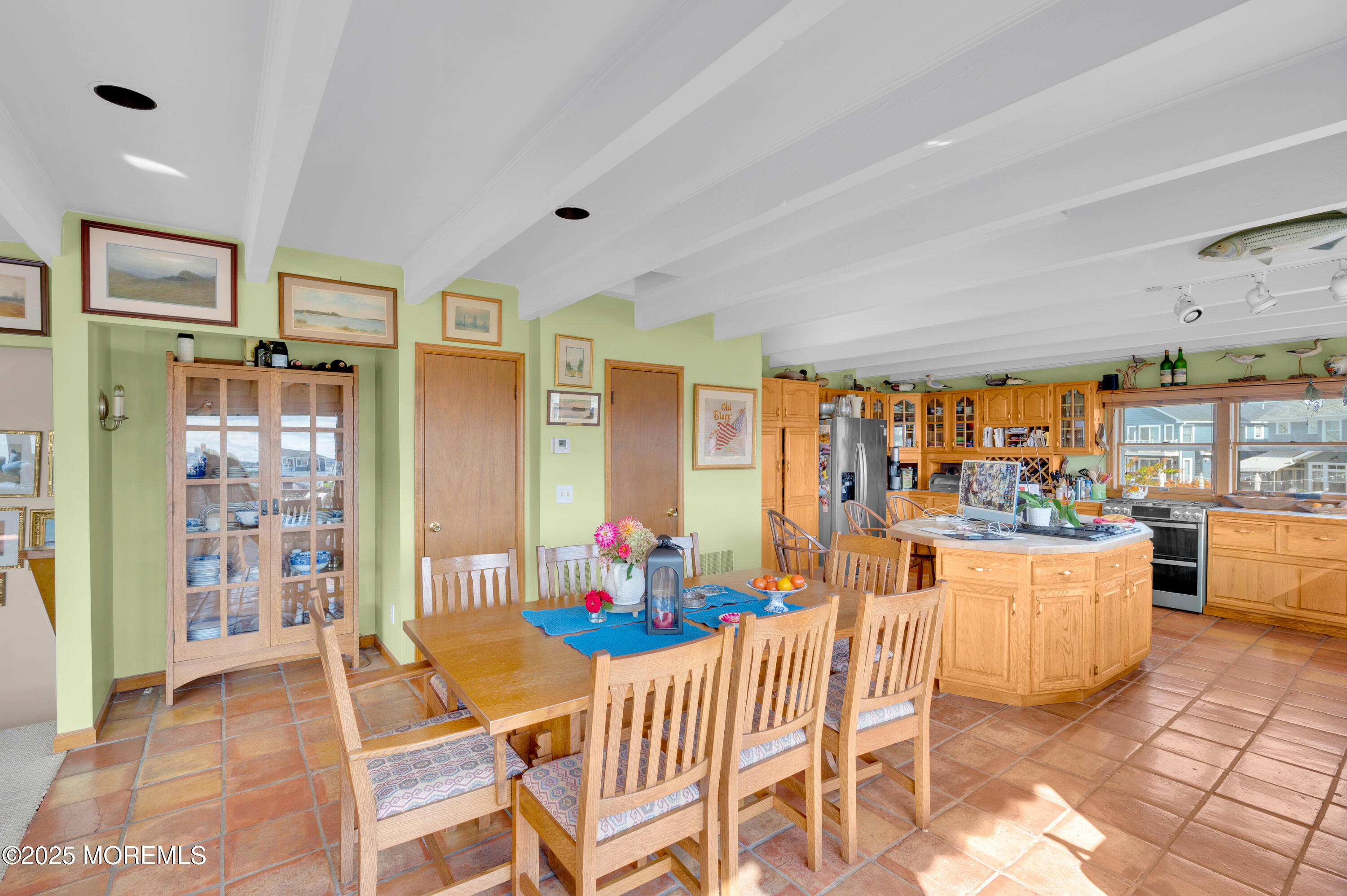 1700 Rue Mirador Point Pleasant, NJ 08742 - Photo 36 of 63 a dining room with furniture and chandelier