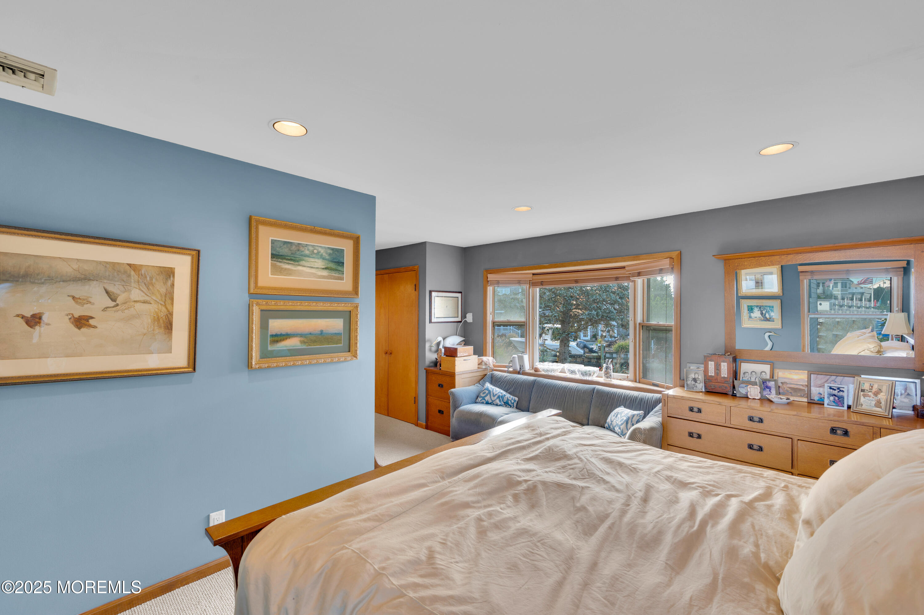 1700 Rue Mirador Point Pleasant, NJ 08742 - Photo 49 of 63 a bedroom with a large bed and a large window