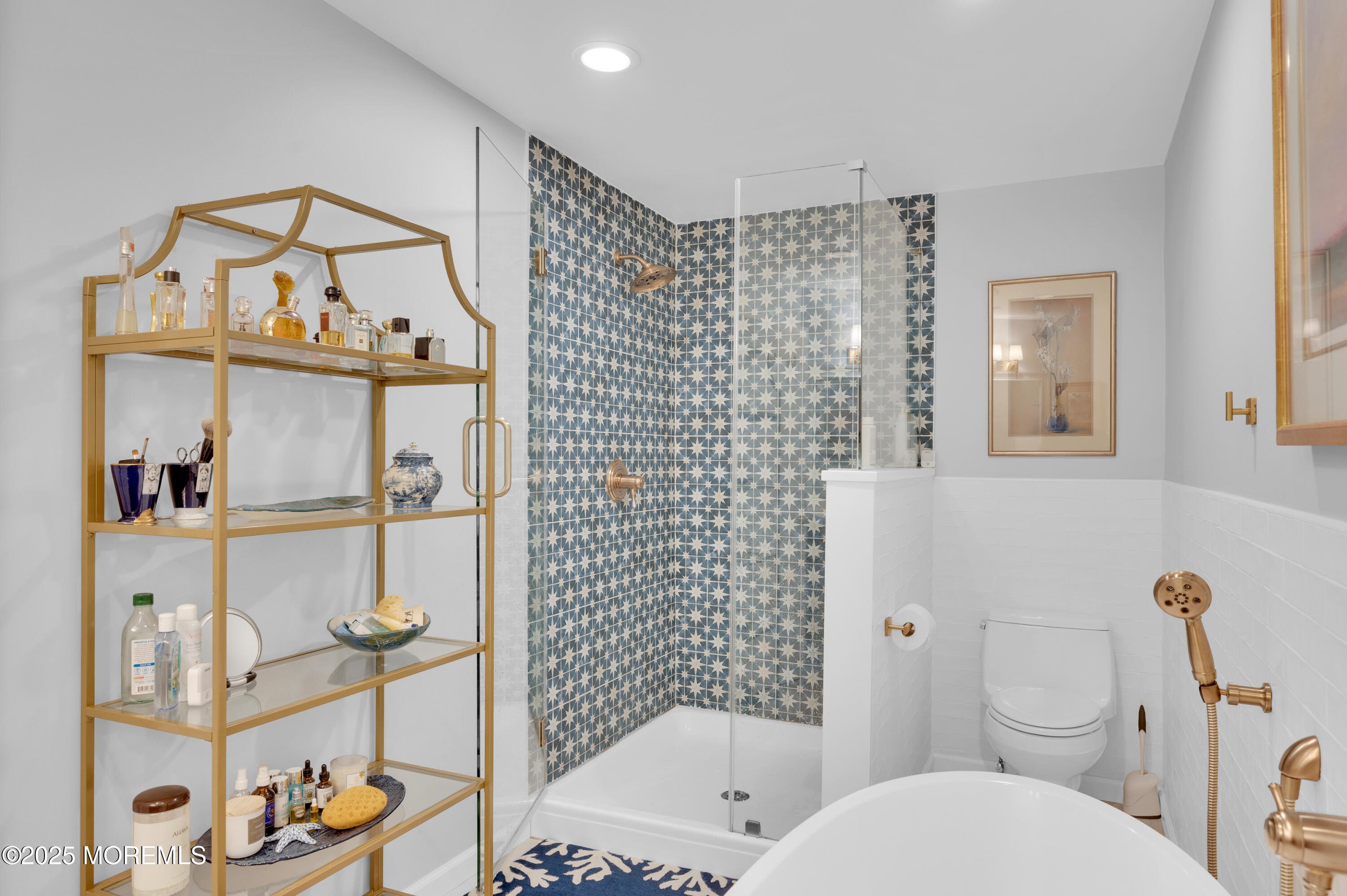 1700 Rue Mirador Point Pleasant, NJ 08742 - Photo 52 of 63 a bathroom with a toilet a sink and mirror