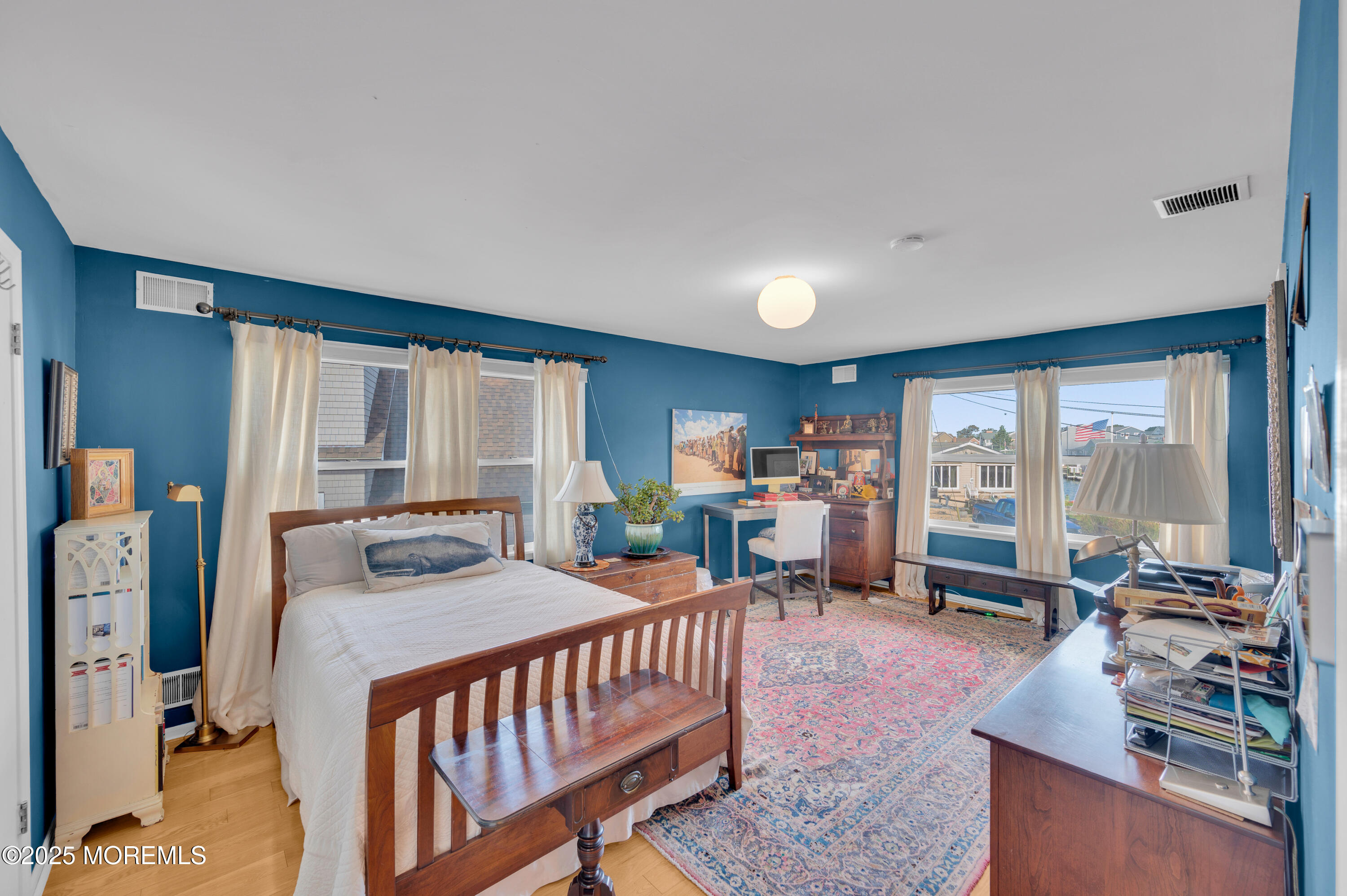 1700 Rue Mirador Point Pleasant, NJ 08742 - Photo 54 of 63 a bedroom with furniture and a large window