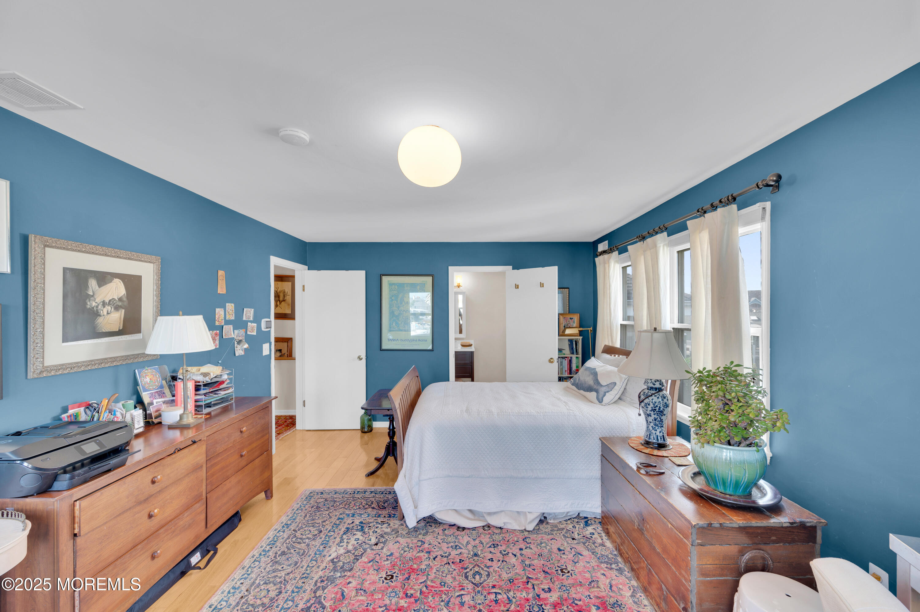 1700 Rue Mirador Point Pleasant, NJ 08742 - Photo 55 of 63 a bedroom with furniture and a bed