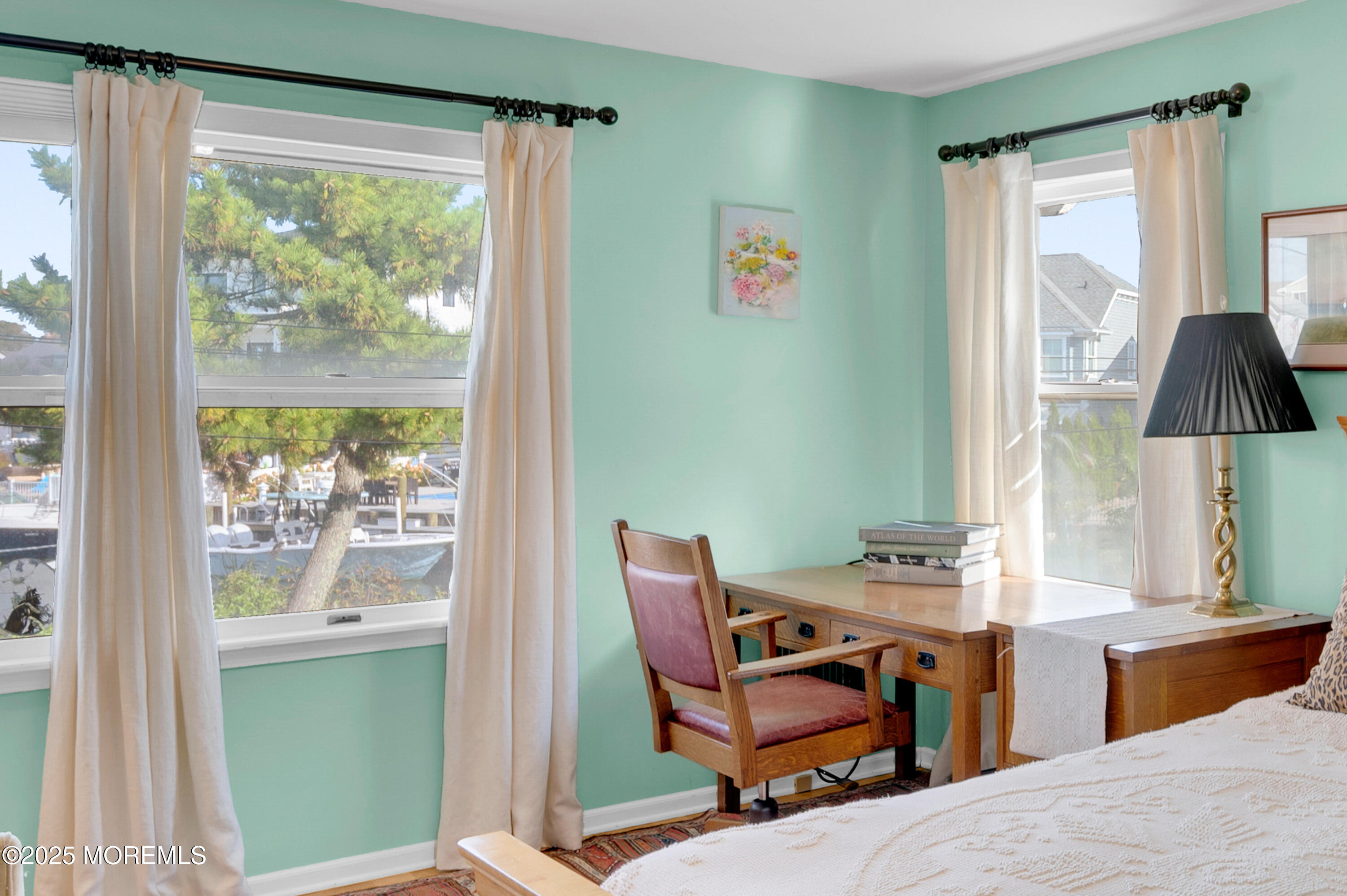 1700 Rue Mirador Point Pleasant, NJ 08742 - Photo 57 of 63 a bedroom with furniture and a window