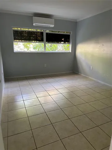a view of an empty room with window