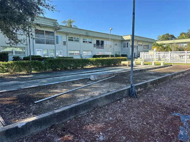 a view of a house with a door and a space