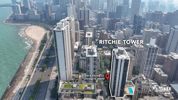 a view of a city with tall buildings