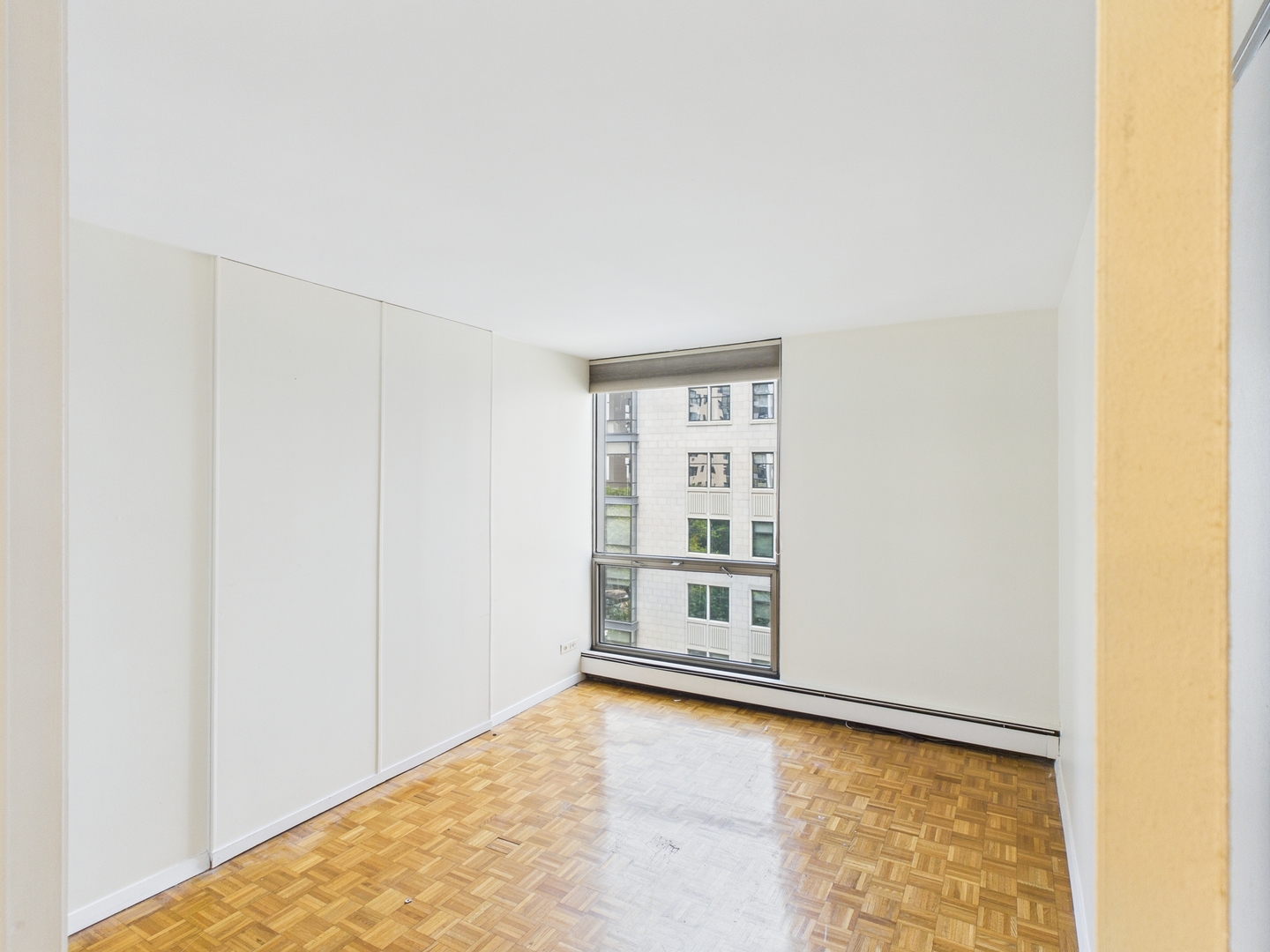 1310 North Ritchie Court, Unit 7D Chicago, IL 60610 - Photo 24 of 38 a view of an empty room with a window