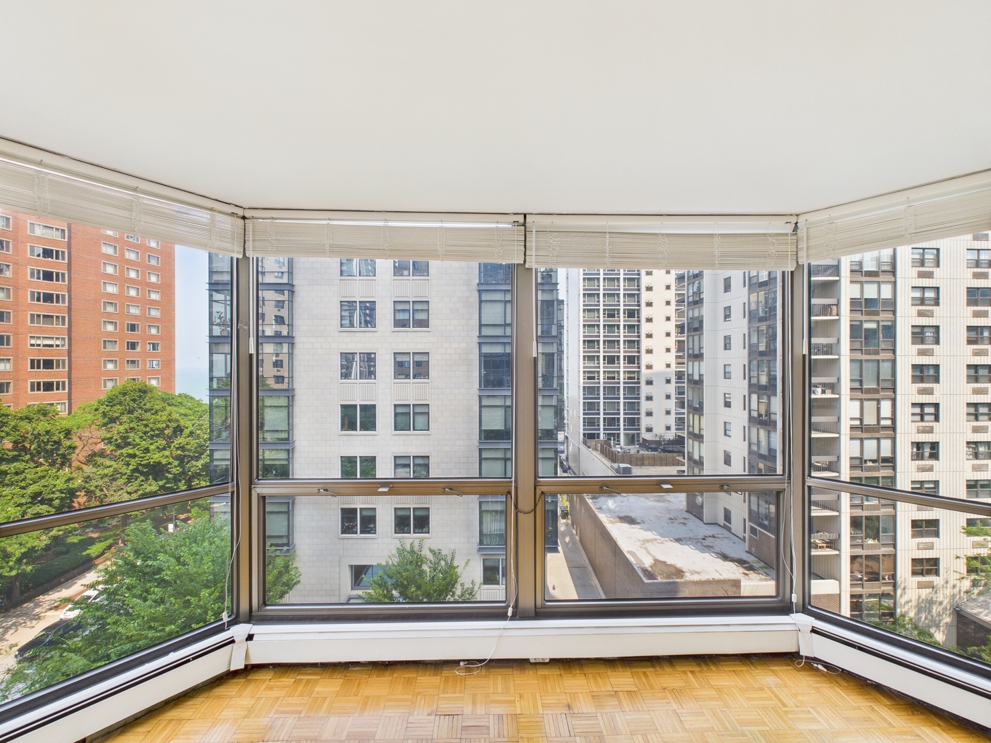 1310 North Ritchie Court, Unit 7D Chicago, IL 60610 - Photo 10 of 38 a view of a living room and a large window