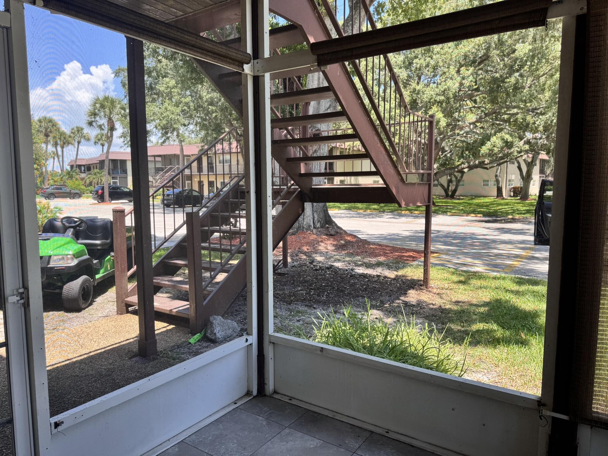3124 Highway 441, Unit J1 Okeechobee, FL 34974 - Photo 24 of 40 a view of swimming pool from a window