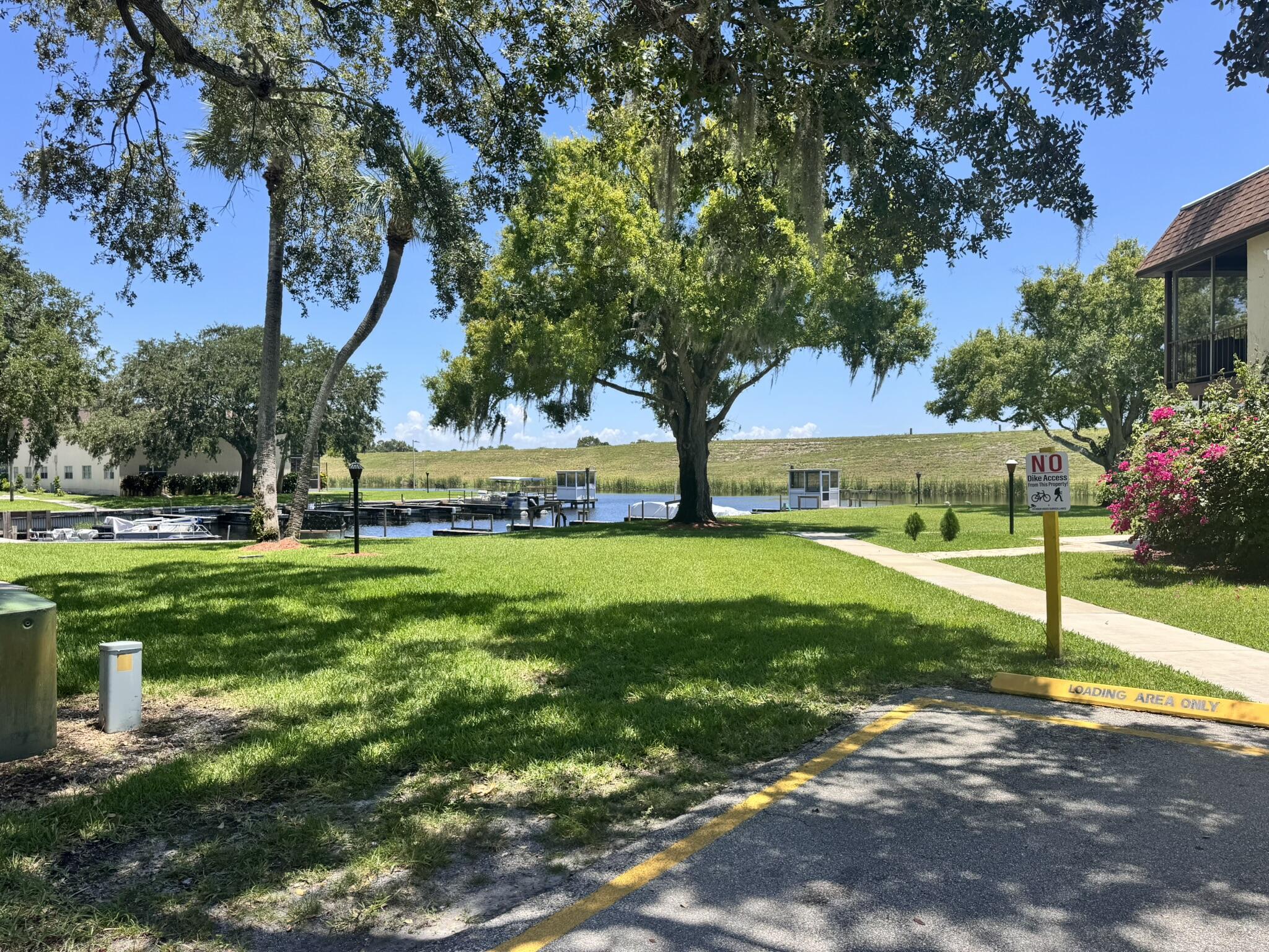 3124 Highway 441, Unit J1 Okeechobee, FL 34974 - Photo 30 of 40 a view of a park with large trees