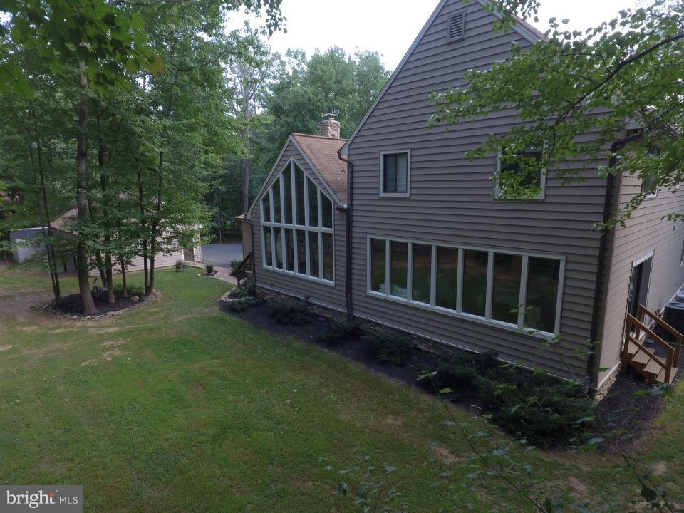 6123 Davis Road Woodbine, MD 21797 - Photo 3 of 30 a view of a house with backyard and sitting area