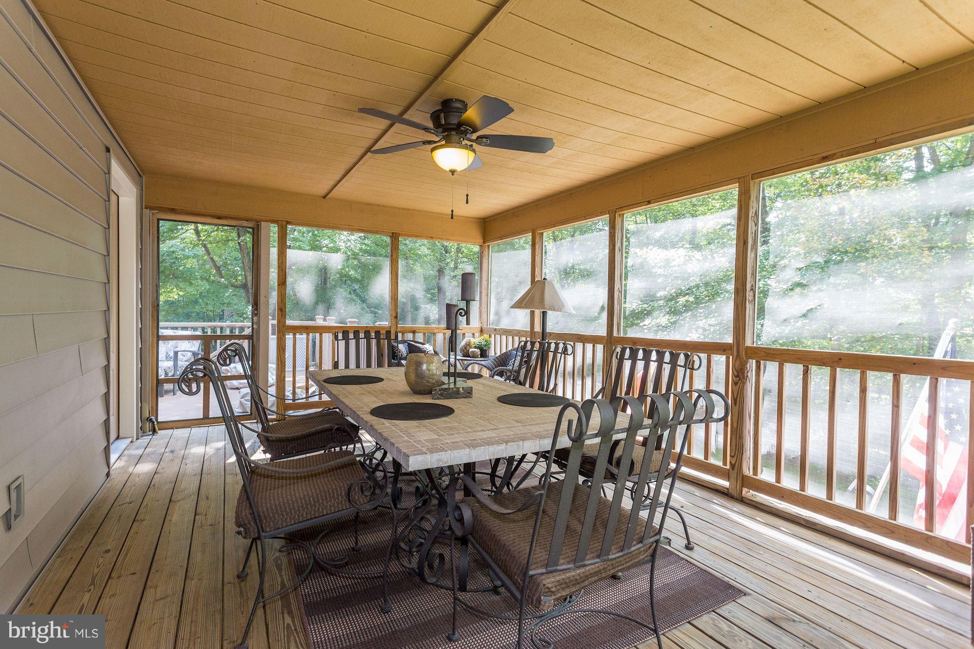 6123 Davis Road Woodbine, MD 21797 - Photo 28 of 30 a view of a dining room with furniture window and outside view