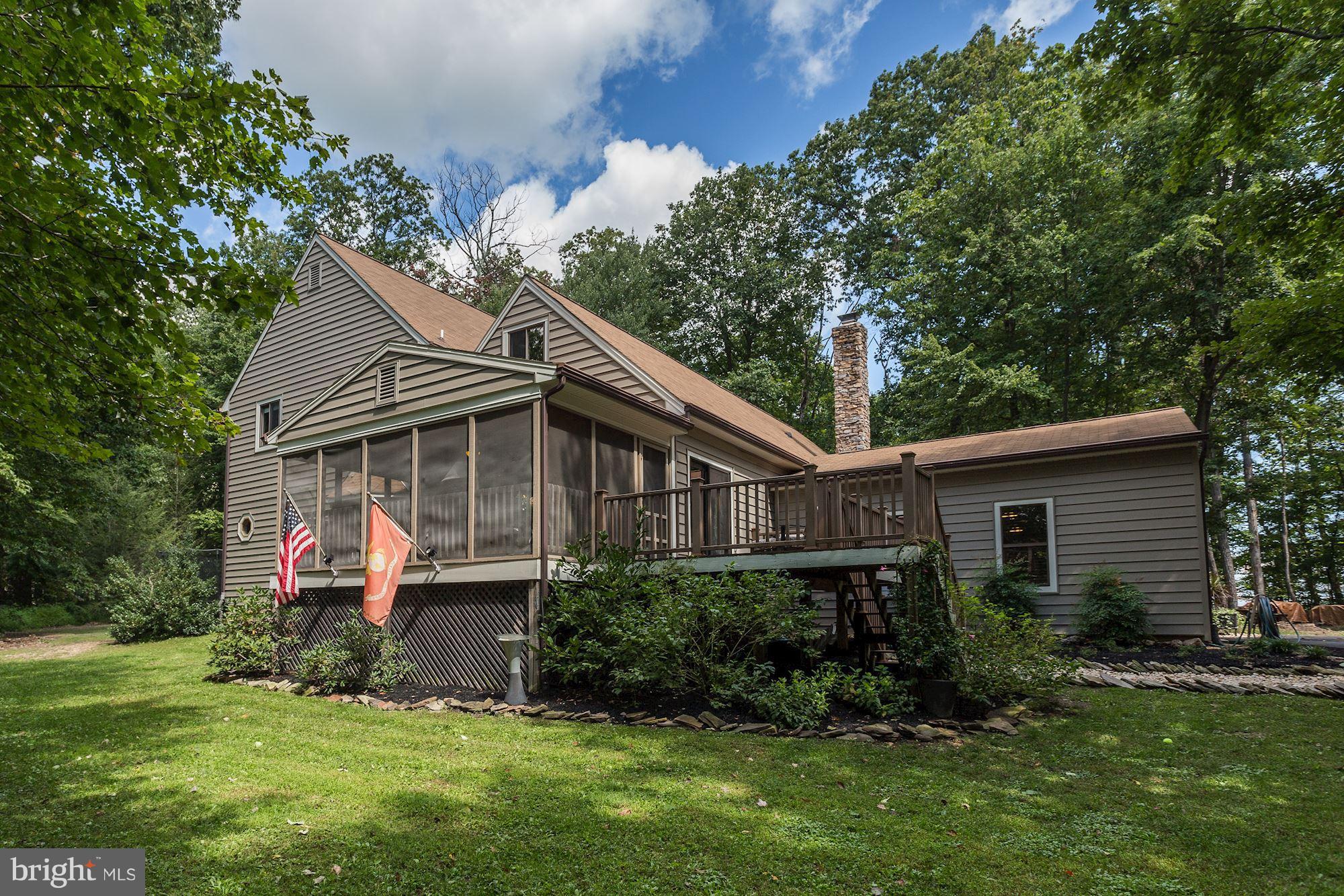 6123 Davis Road Woodbine, MD 21797 - Photo 7 of 30 a front view of house with yard and green space