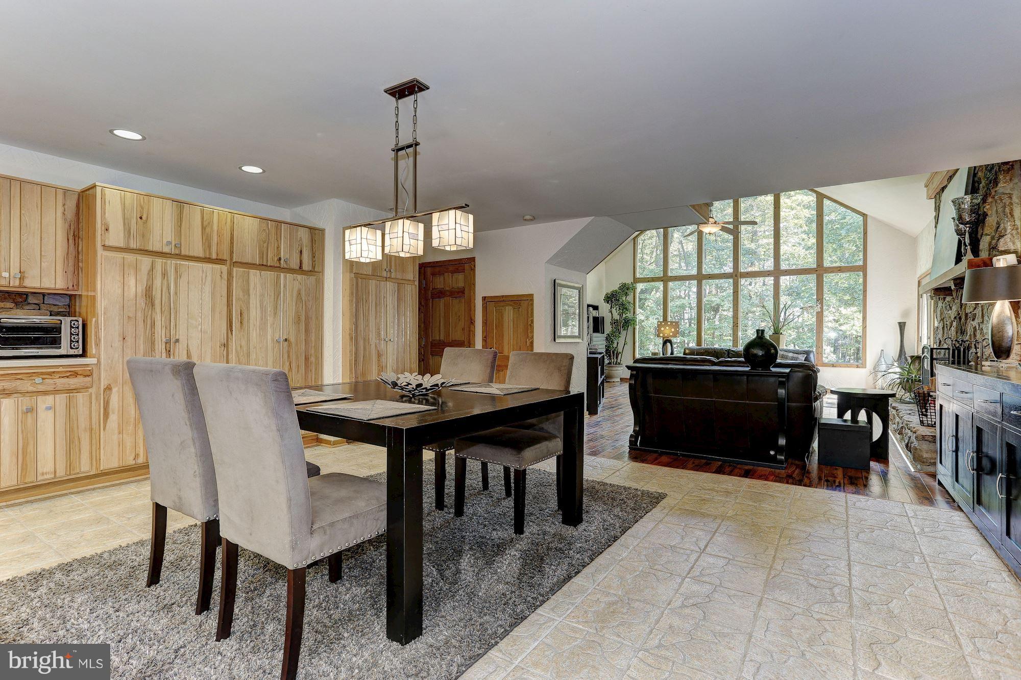 6123 Davis Road Woodbine, MD 21797 - Photo 10 of 30 a view of a dining room with furniture