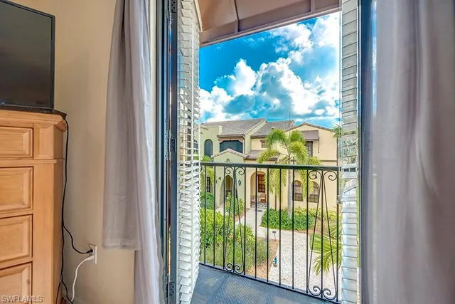 a view of a glass door with a large window