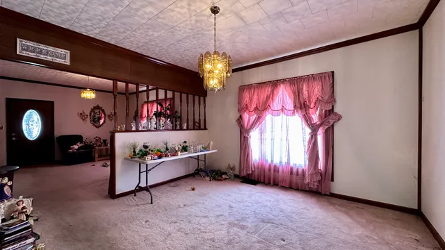 a view of an entryway with a chandelier