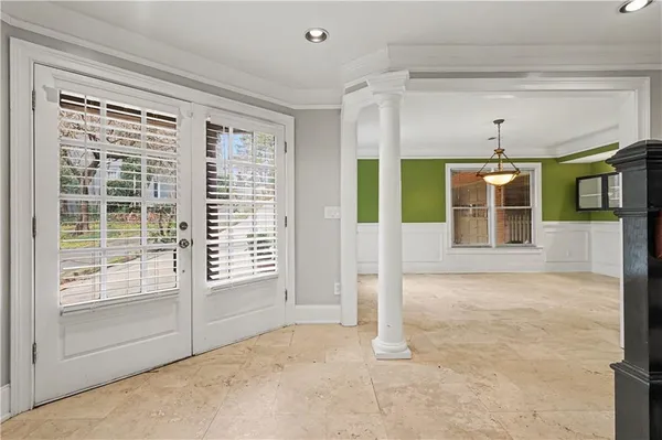 a view of empty room with windows