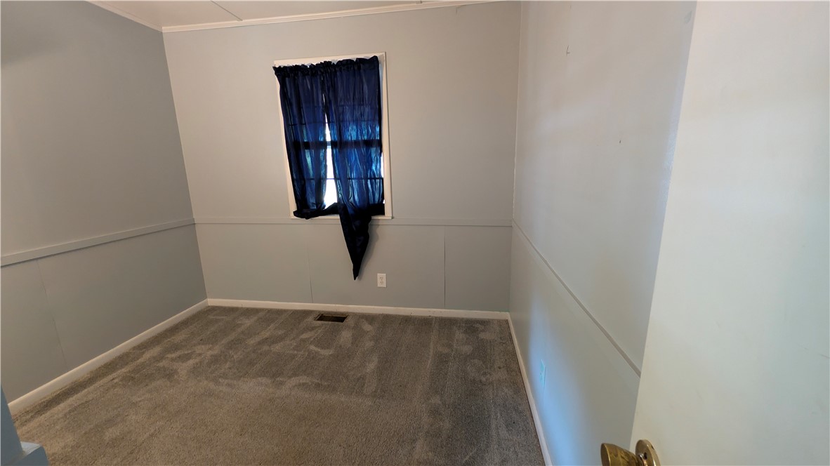 194 Pine Valley Loop Houston, AR 72070 - Photo 11 of 21 Carpeted interior space with a single window featuring window treatments