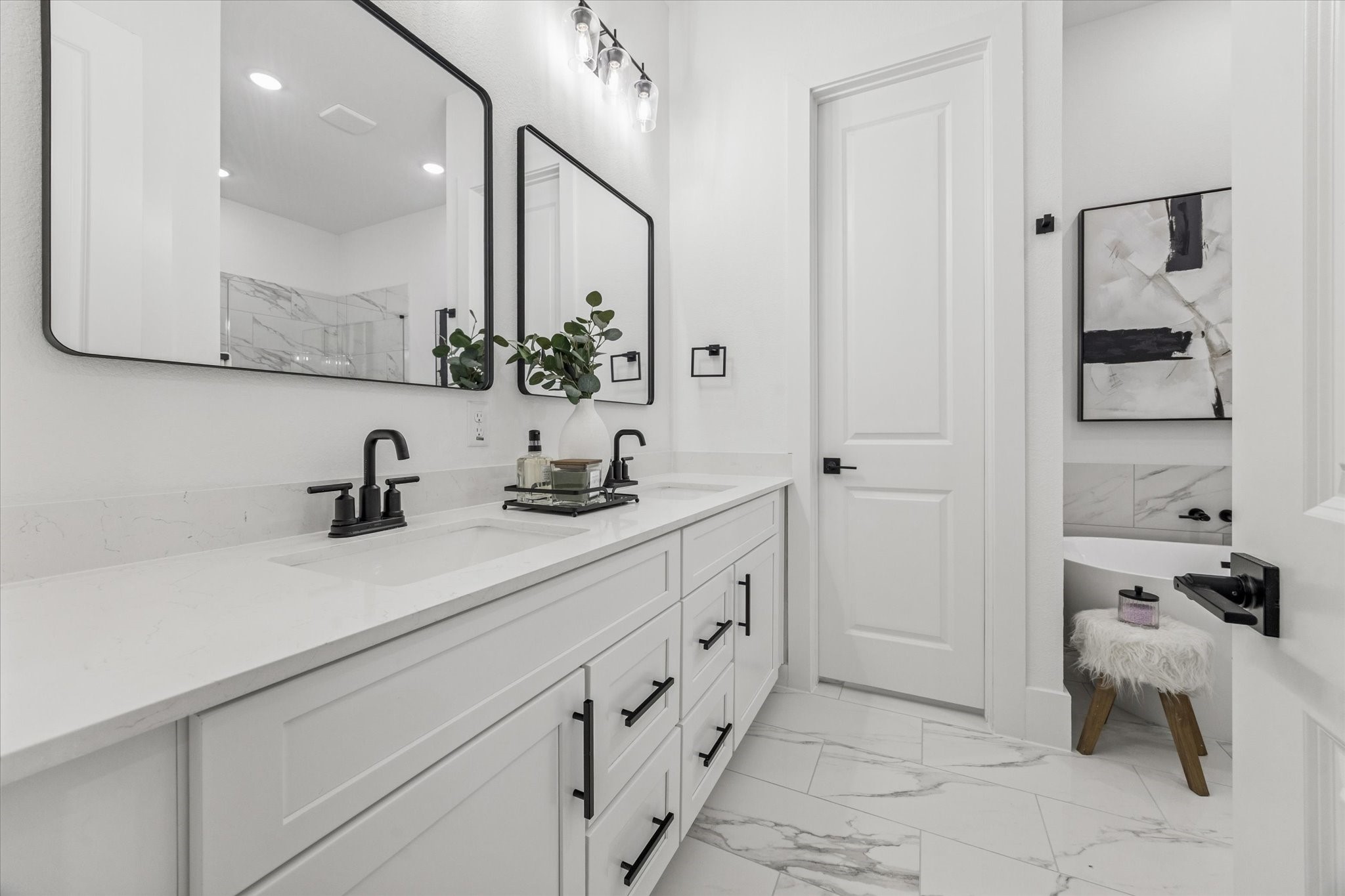 5612 Azores Houston, TX 77091 - Photo 25 of 38 a bathroom with a sink and a mirror