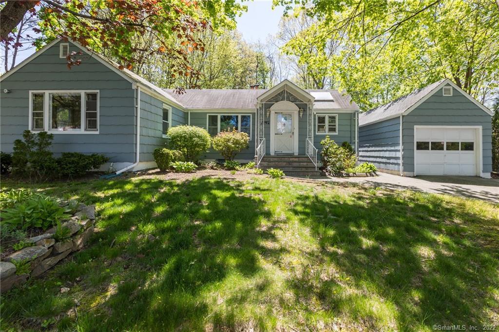 92 Intervale Road Bridgeport, CT 06610 - Photo 1 of 1 a front view of house with yard and green space