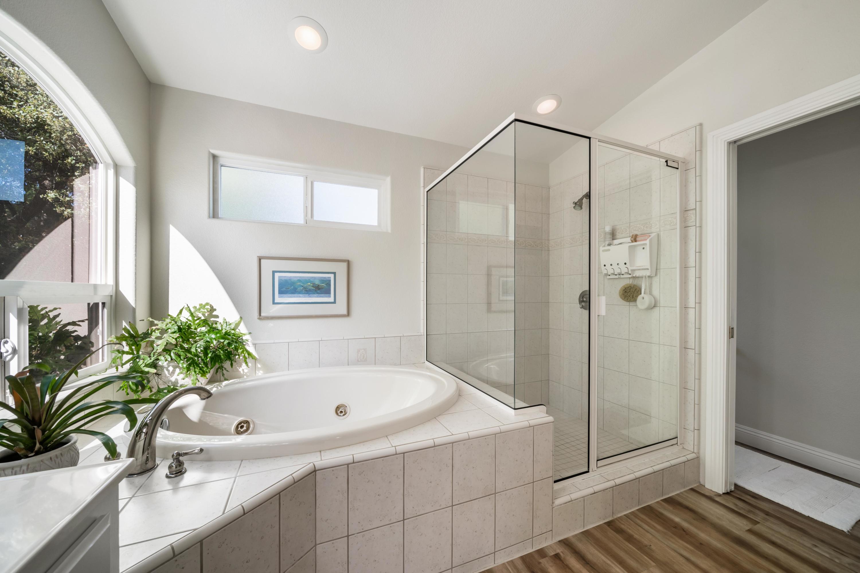 7777 Justice Mine Road Redding, CA 96001 - Photo 25 of 59 a bathroom with a tub and shower